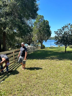 four board fencing with lake small