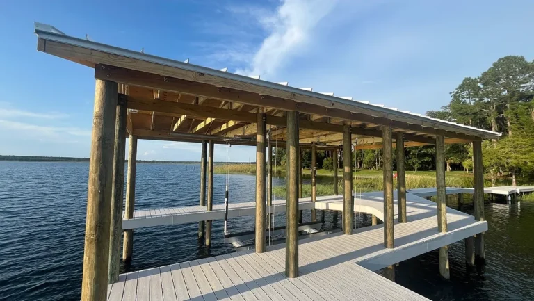 Boathouse with boat lift built by JSC Contracting
