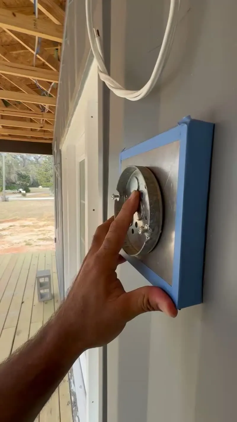 container-home-finish-work-detail - JSC Contracting Inc JSC crew protecting fixtures during container home construction