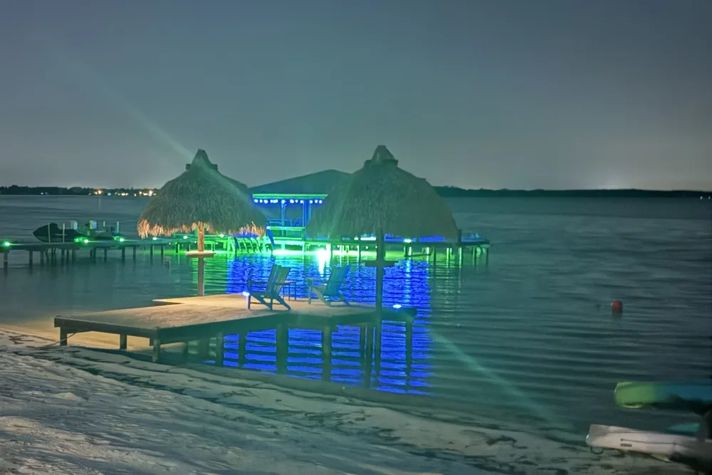 Boathouse and boat lift on Lake Weir built by JSC Contracting
